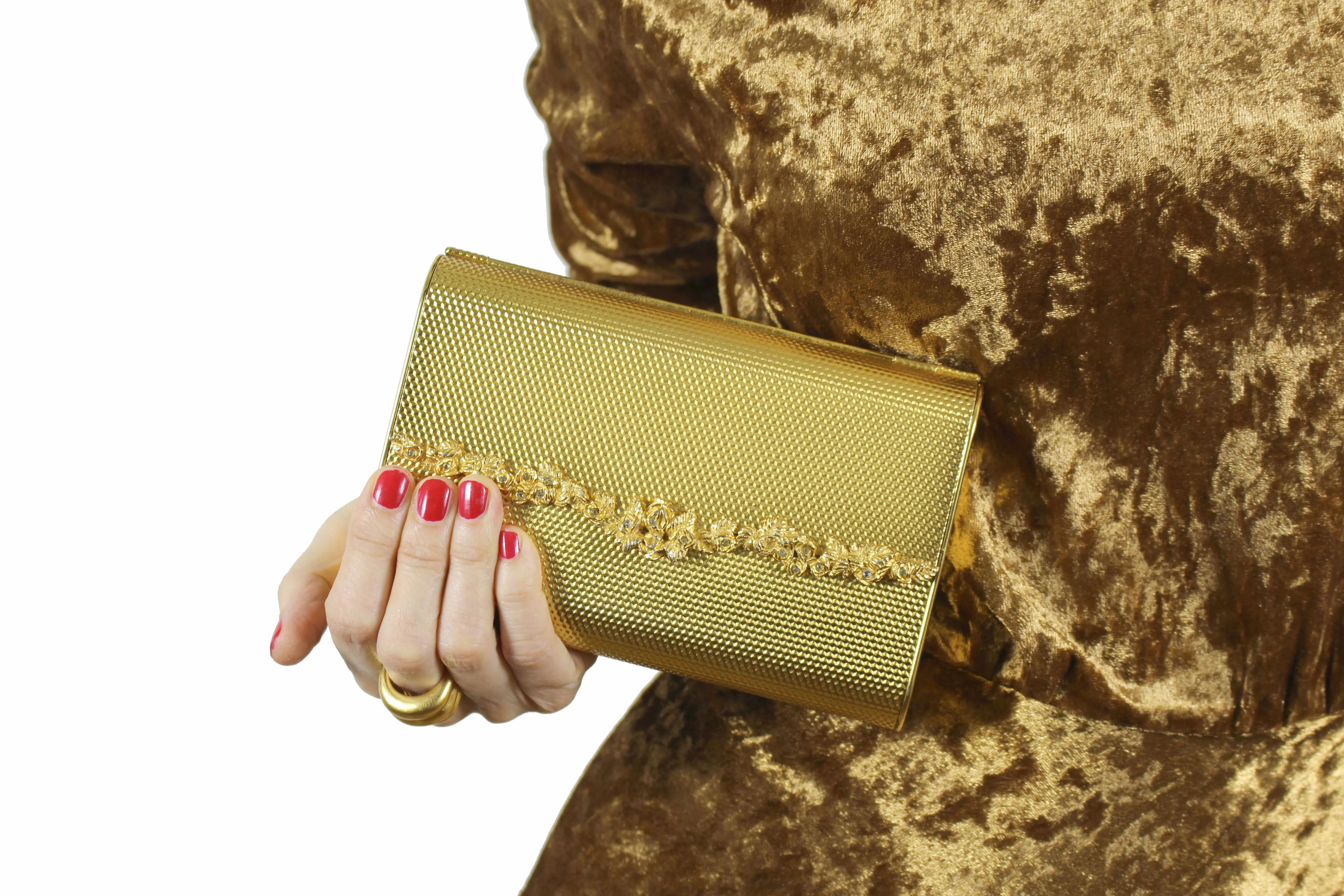 COBLENTZ embossed golden metal clutch